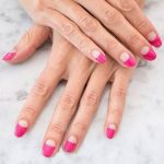 11-a-bold-and-colorful-take-on-French-nails-with-long-pink-tips